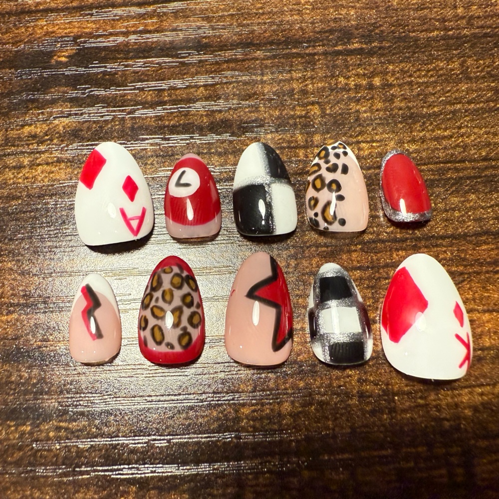 Red and Black Patterned gel x nails